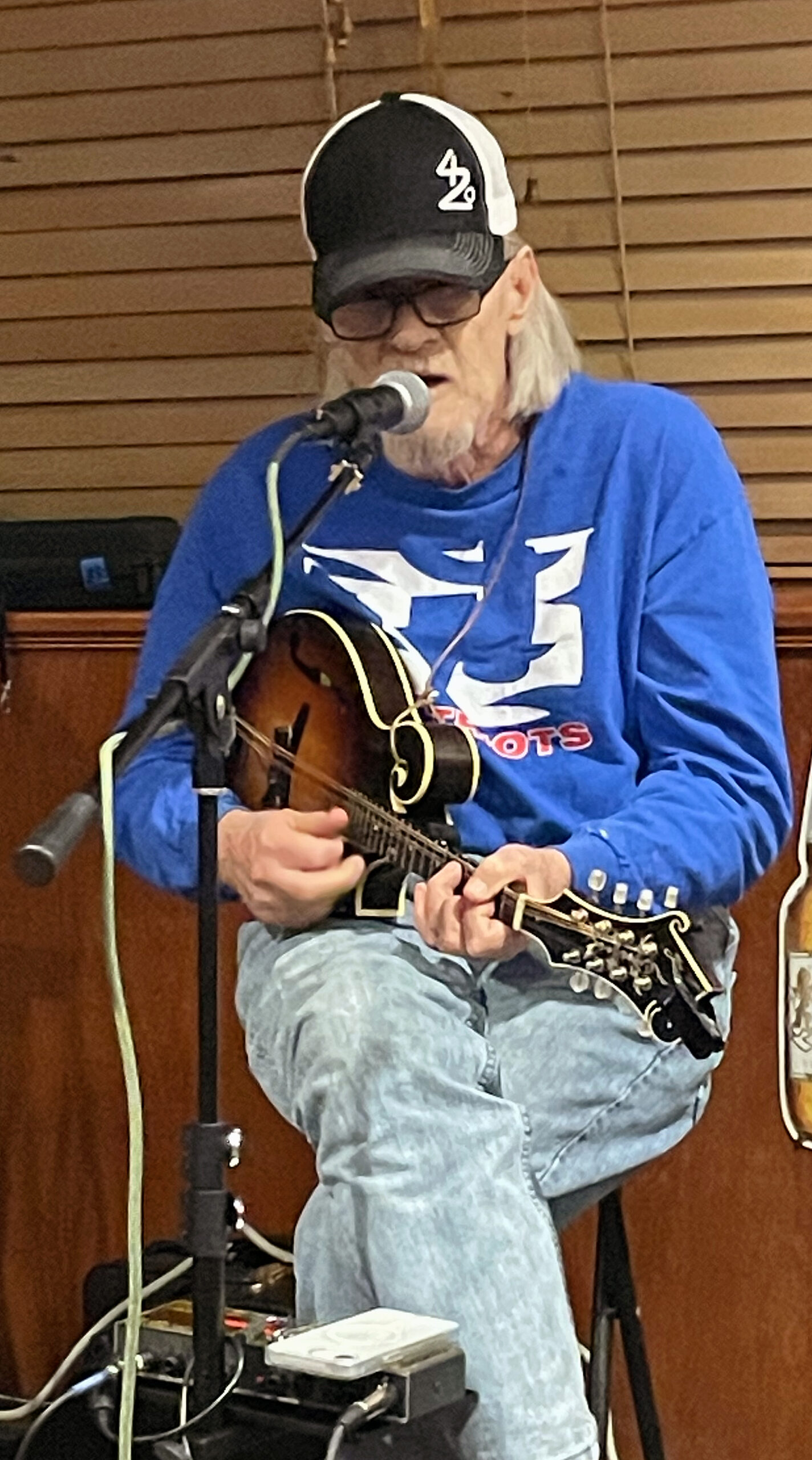 Barry Smothers singing and playing mandolin